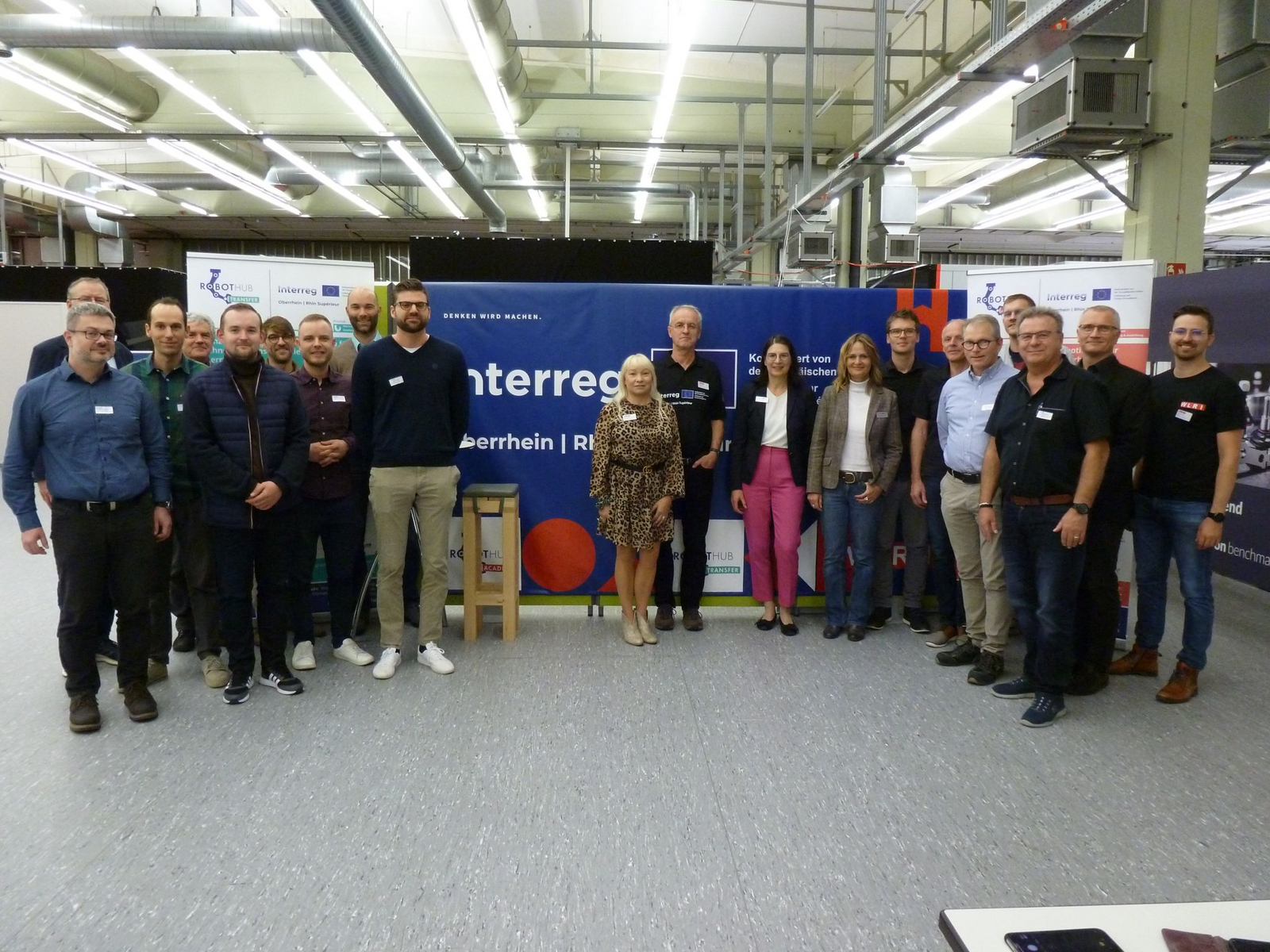 A group of people in a big hall