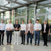 (von links): Markus Köster (Chief Innovation to Business, EDF Berlin), Professor Dr. Wolfgang Bessler (Leiter Institut für nachhaltige Energiesysteme Hochschule Offenburg), Professor Dr. Stephan Trahasch (Rektor Hochschule Offenburg), Marco Steffens (Oberbürgermeister Stadt Offenburg), Lars Mosdorf (Geschäftsführer Flughafen Düsseldorf), Werner Mäurer (Geschäftsführer HIWIN Offenburg), Florian Appel (Geschäftsführer Black Forest Innovation Offenburg), Dr. Thomas Peukert (CEO Meiko Group Offenburg) und Lars Amsbeck (Managing Director HelioHeat Offenburg) stehen vor dem D-Gebäude der Hochschule