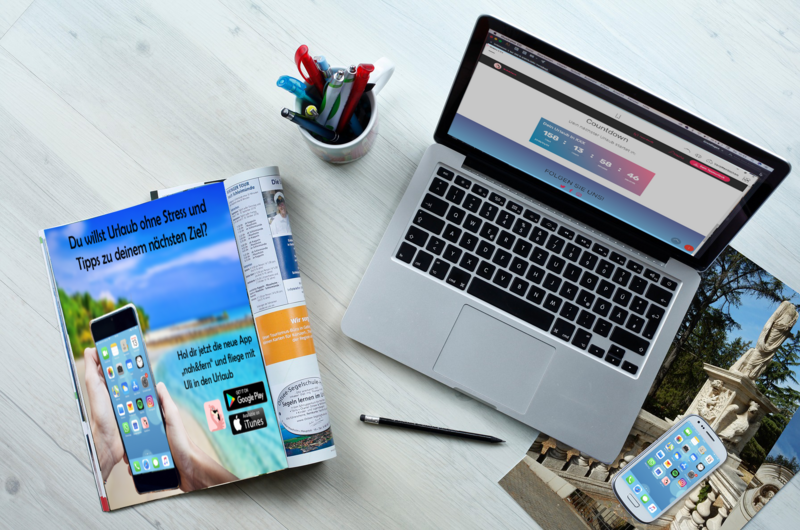 Laptop und Broschüre über Urlaub ohne Stress