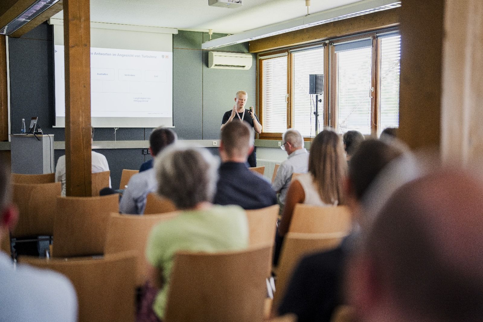 A person giving a presentation to a group